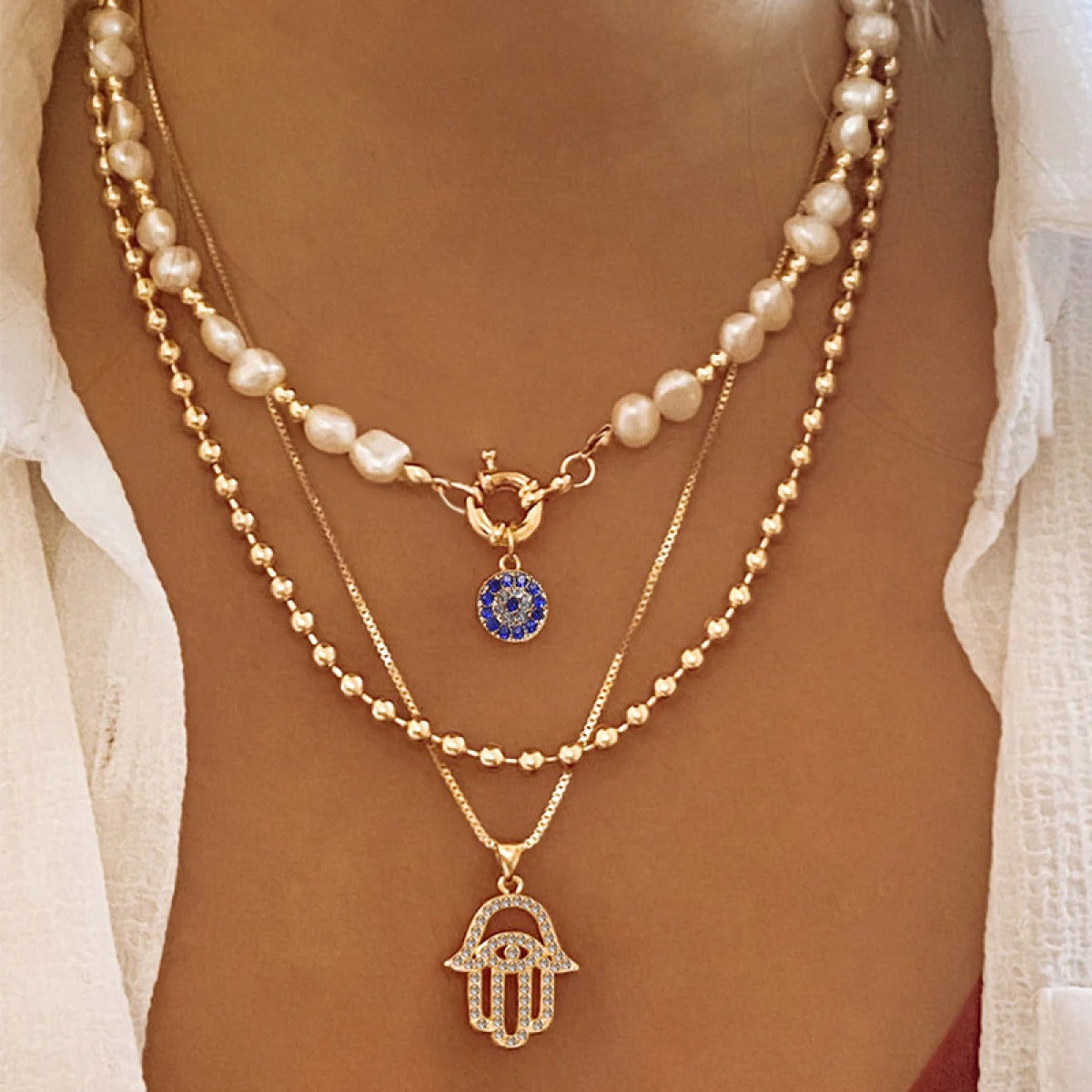 Jade – Collar de perlas de múltiples niveles y Hamsa