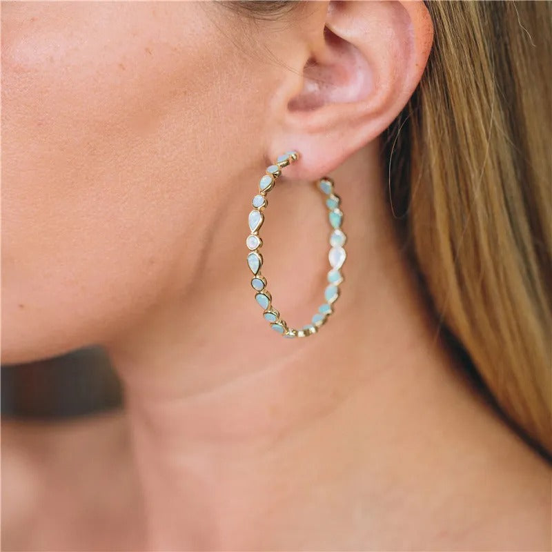 Raya – Aros vintage dorados con ópalo azul