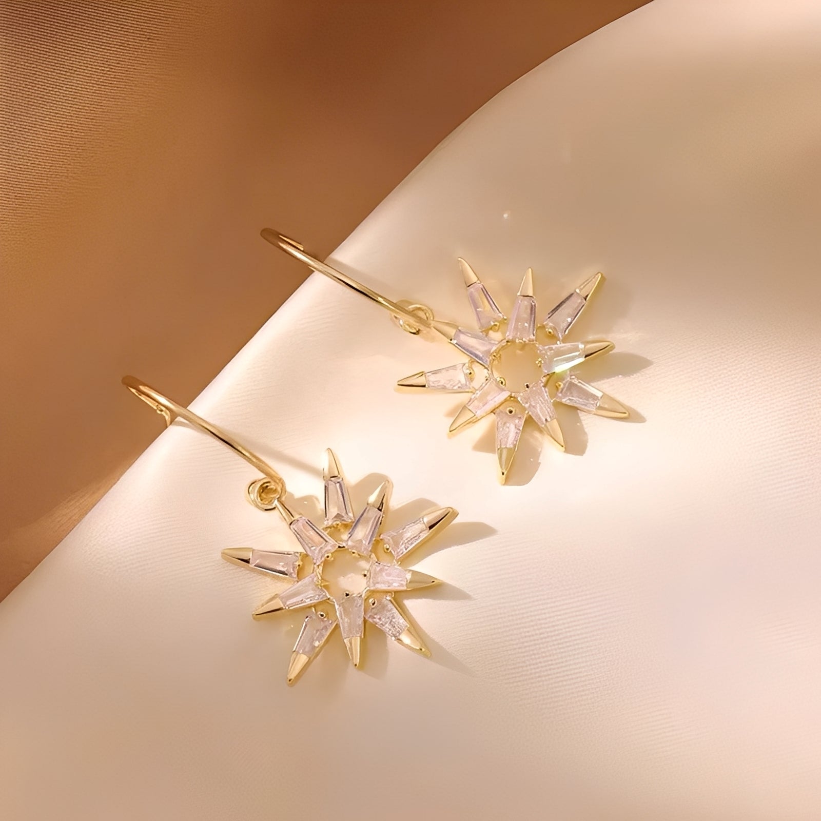 Xienna – Pendientes de estrellas doradas brillantes