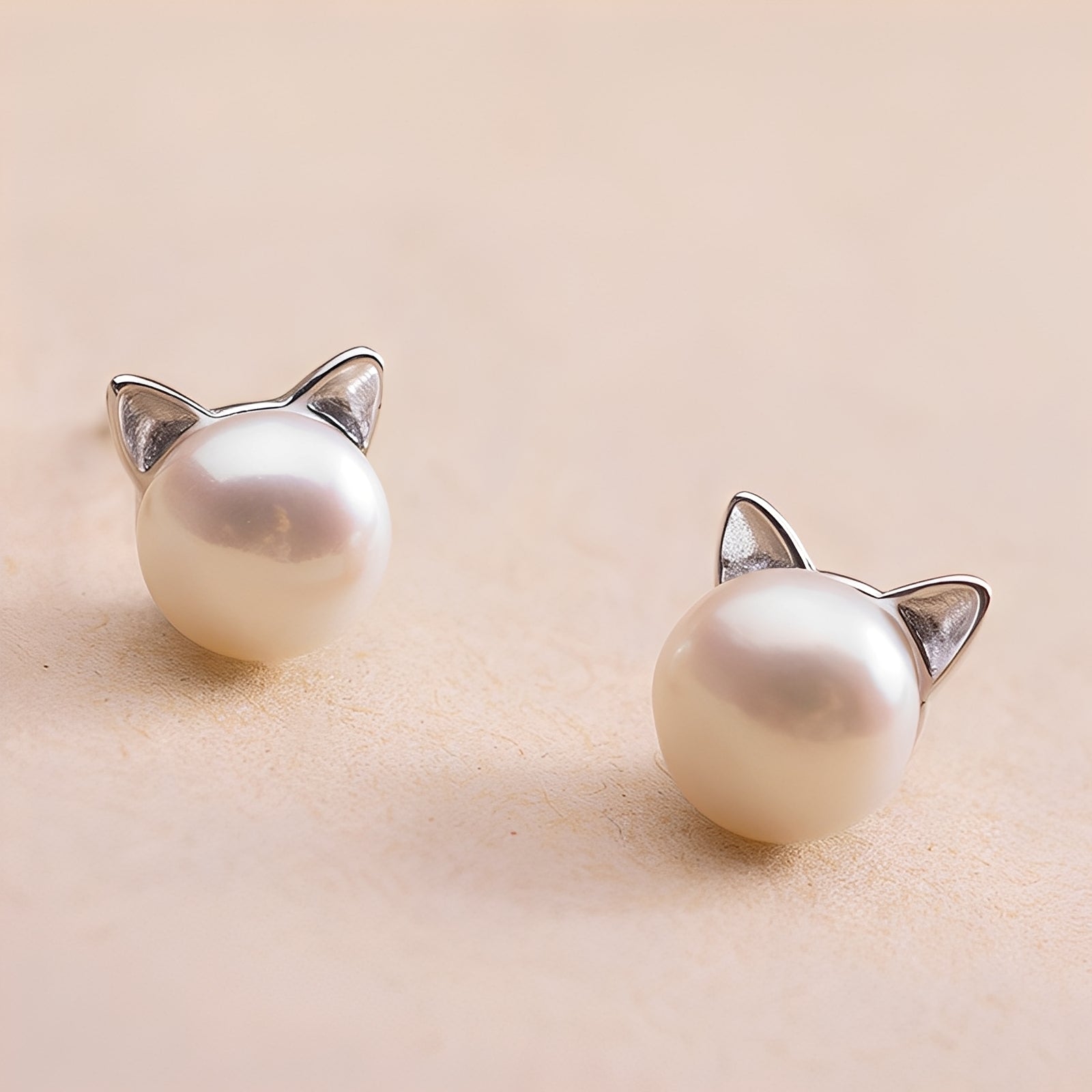 Nori – Pendientes de chatones y perlas de plata