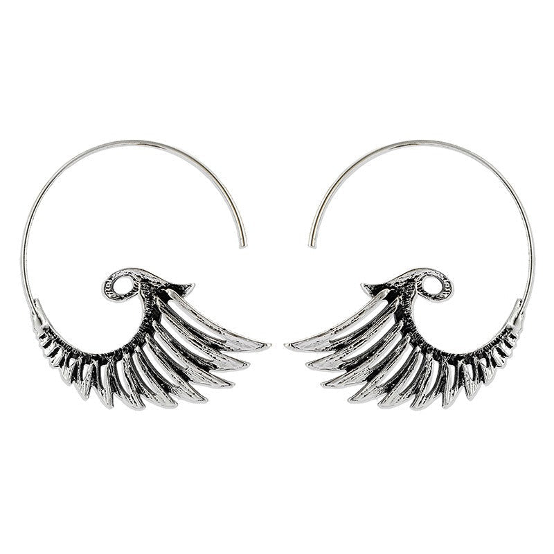 Zia – Pendientes dorados con diseño de alas