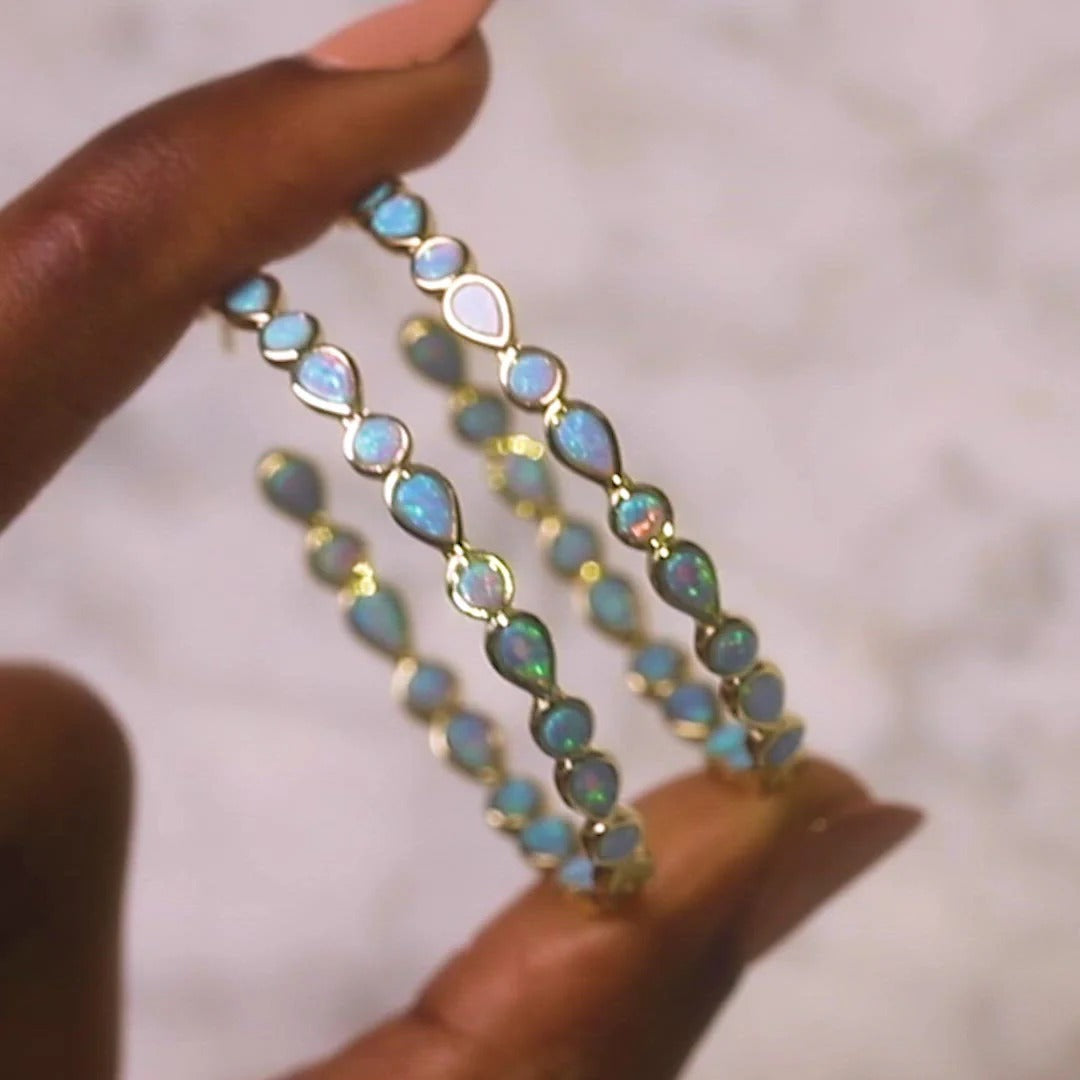 Raya – Aros vintage dorados con ópalo azul