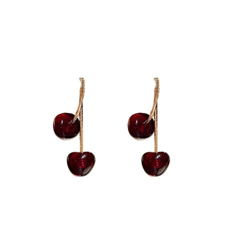 Cheri – Pendientes dorados colgantes de cerezo