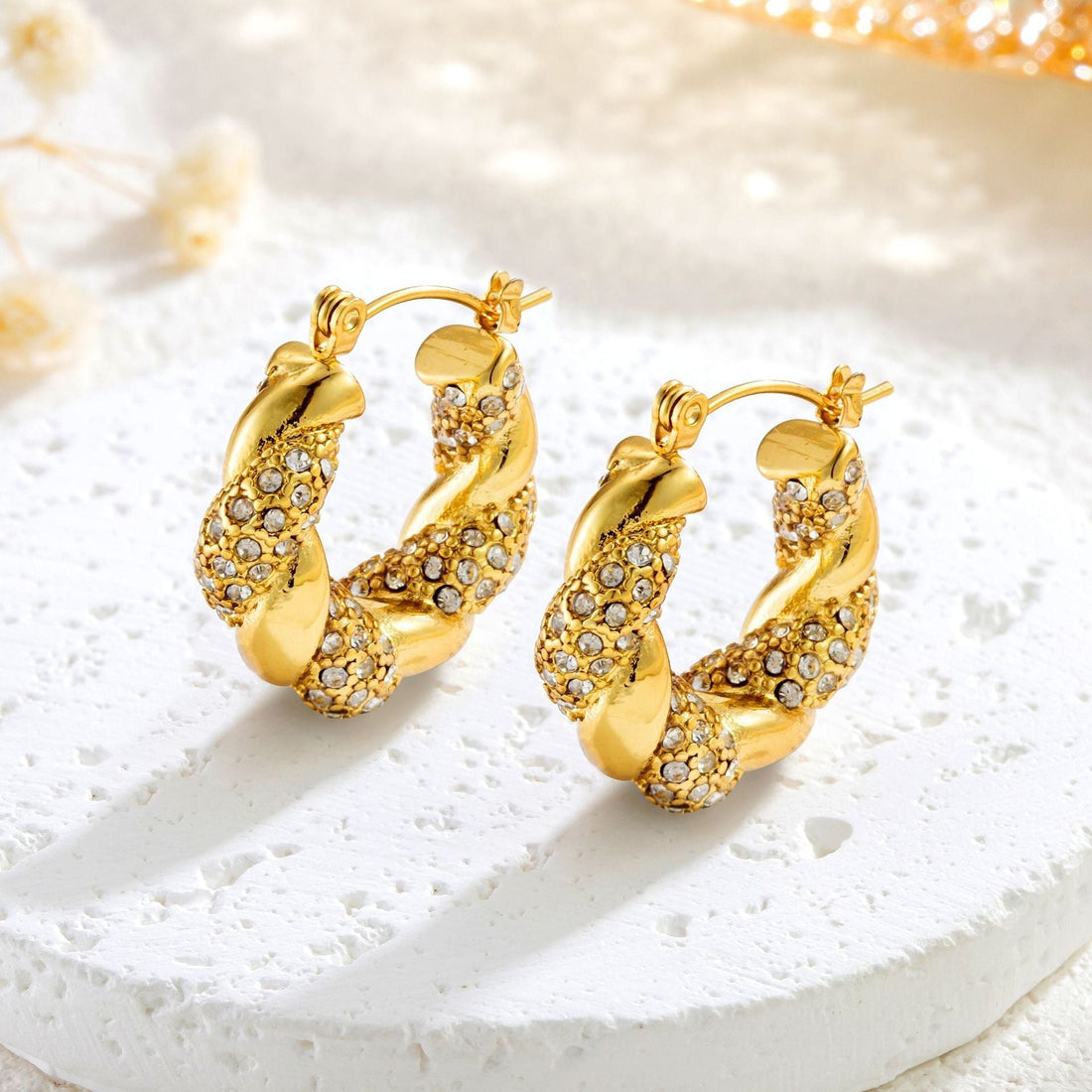 Alix – Pendientes U-Twist en oro