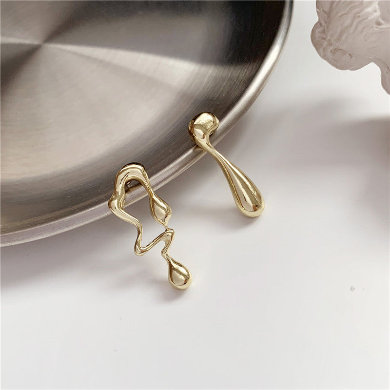 Wilma – Pendientes abstractos desiguales