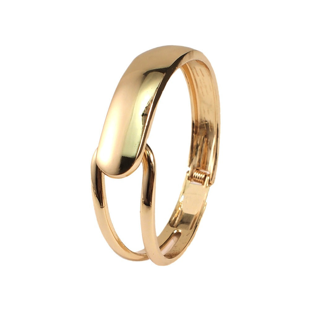 Alyssa – Brazalete dorado elegante