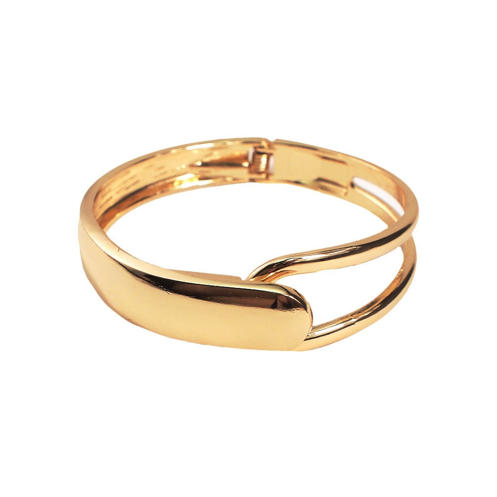 Alyssa – Brazalete dorado elegante