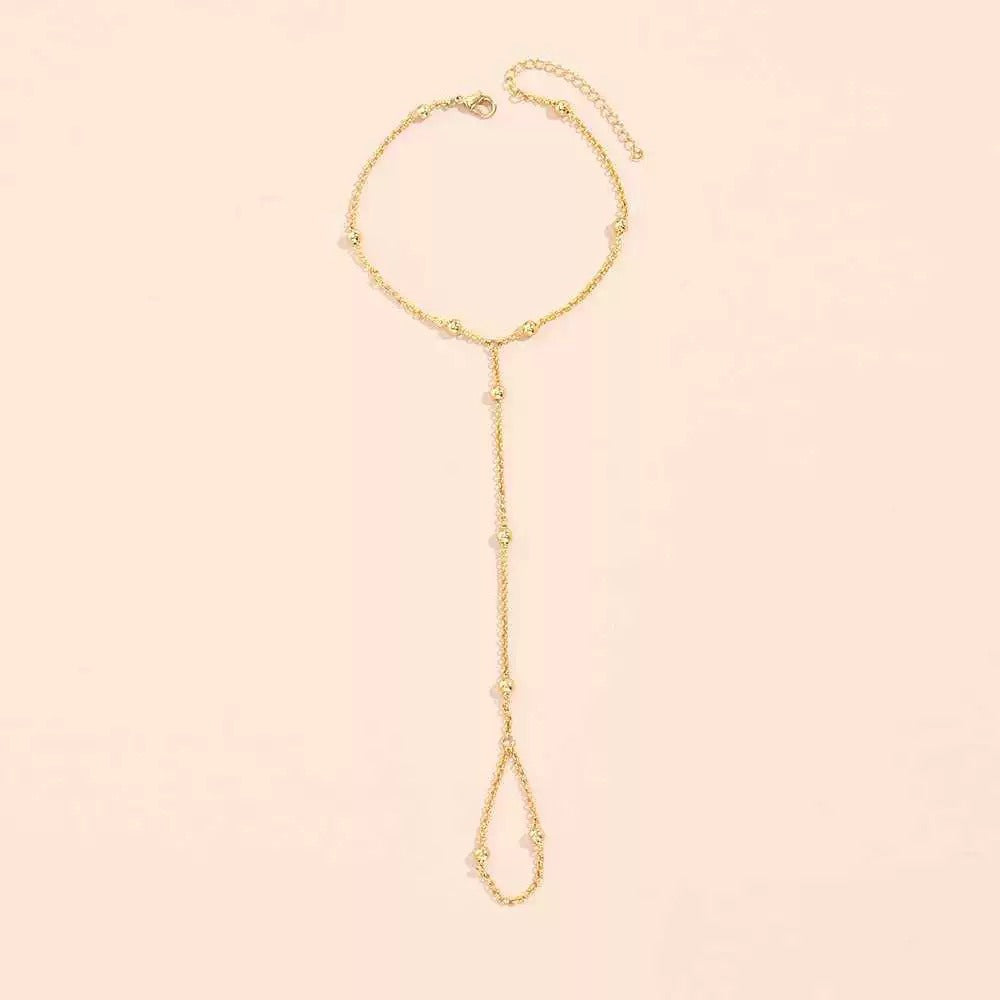 Lisa – Pulsera cadena de perlas y guantes