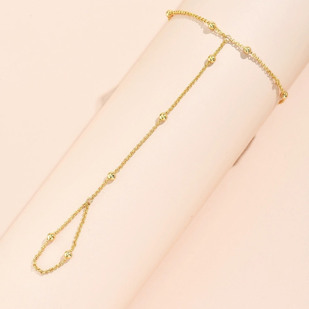 Lisa – Pulsera cadena de perlas y guantes