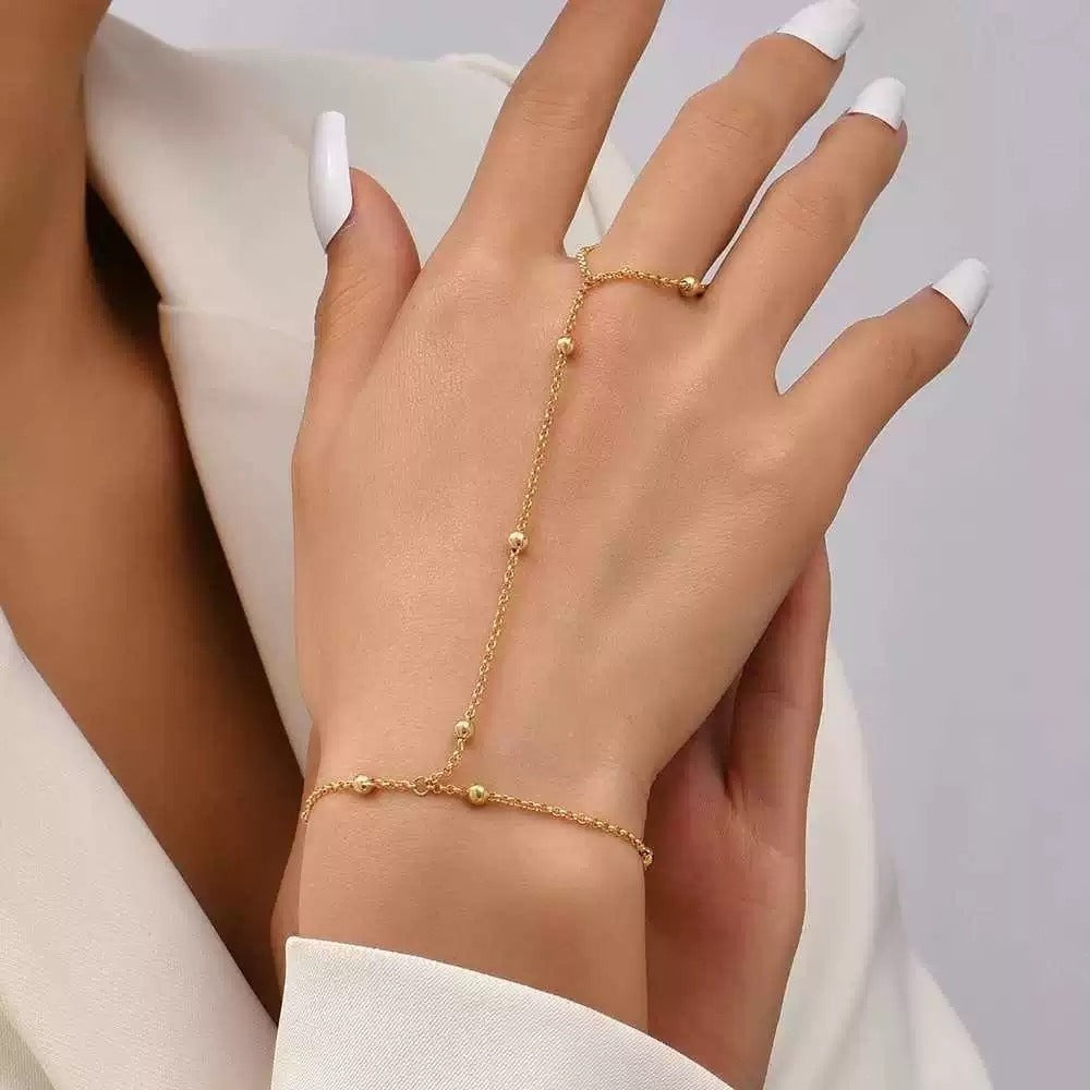 Lisa – Pulsera cadena de perlas y guantes