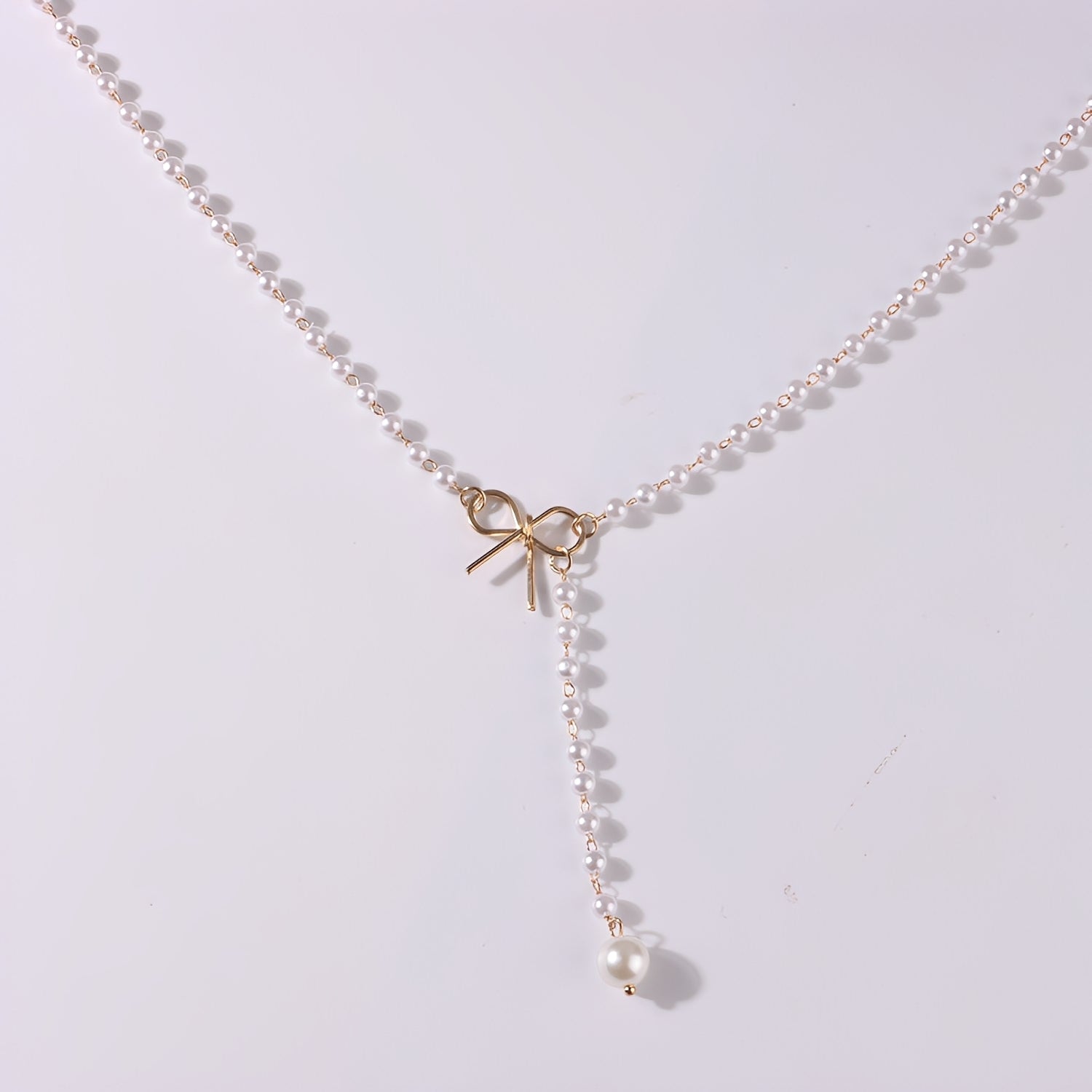 Antoneth – Collar con colgante de lazo con perla