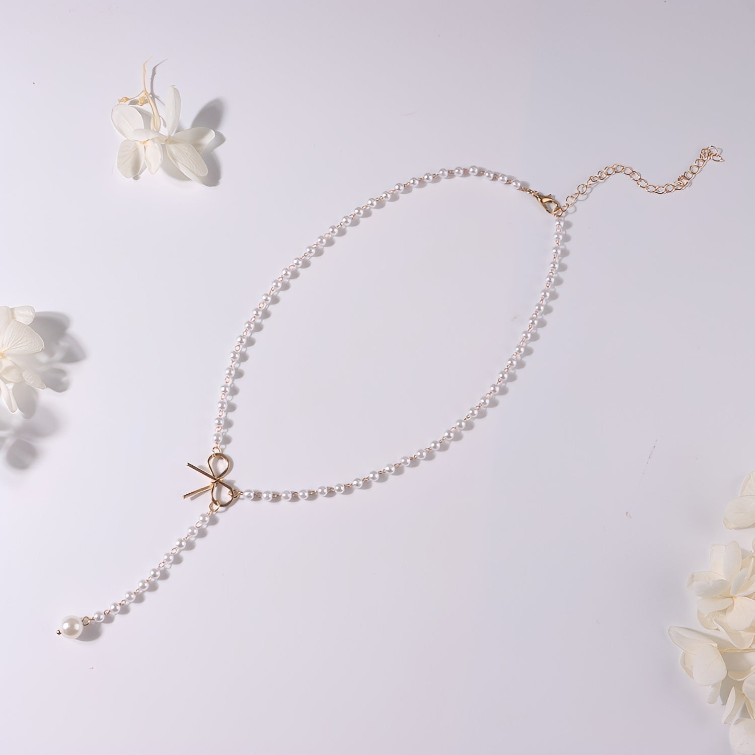 Antoneth – Collar con colgante de lazo con perla