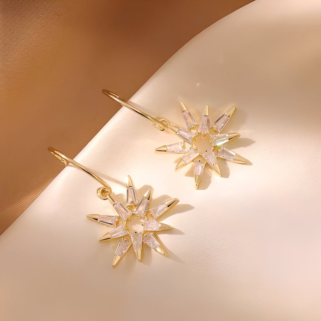 Xienna – Pendientes de estrellas doradas brillantes