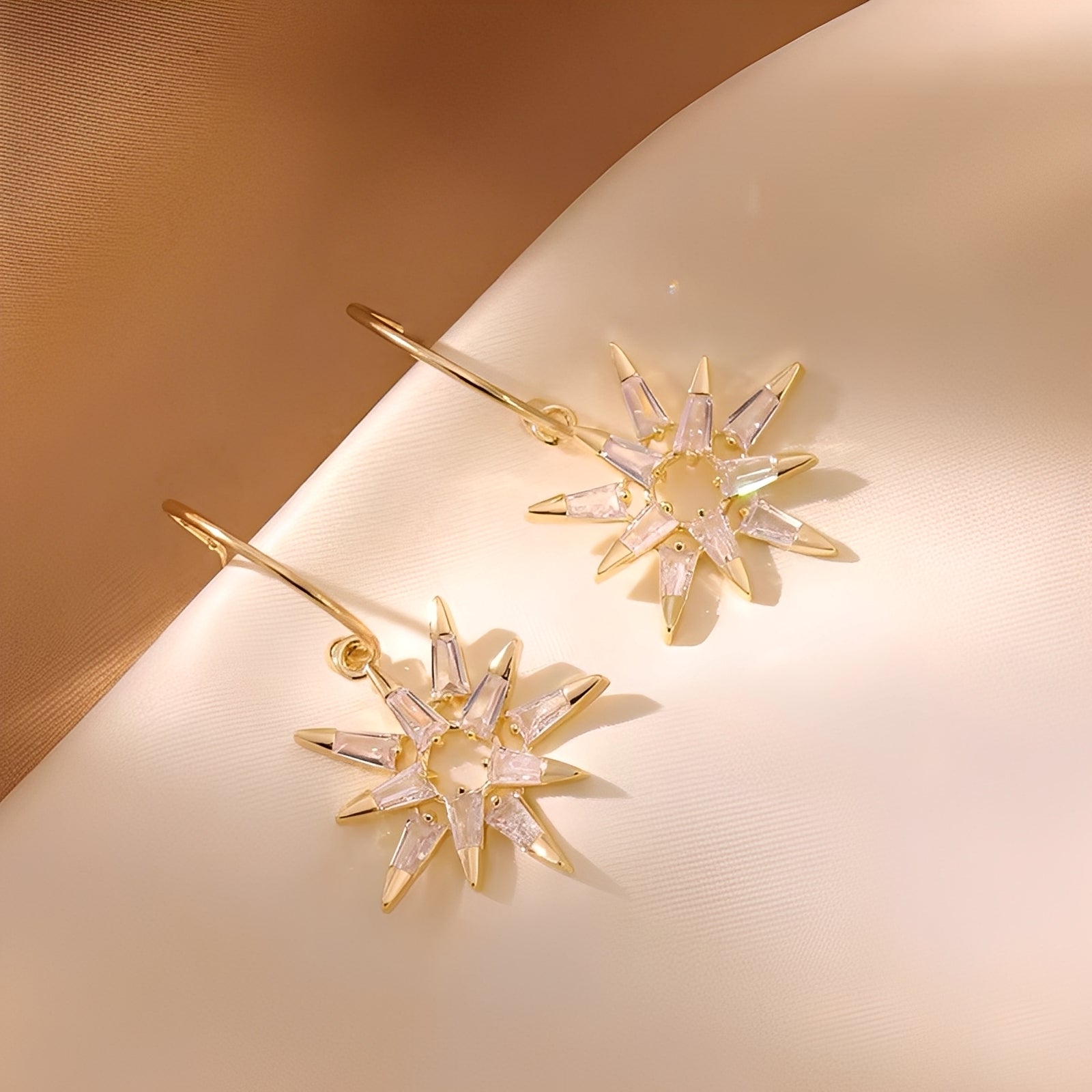 Xienna – Pendientes de estrellas doradas brillantes