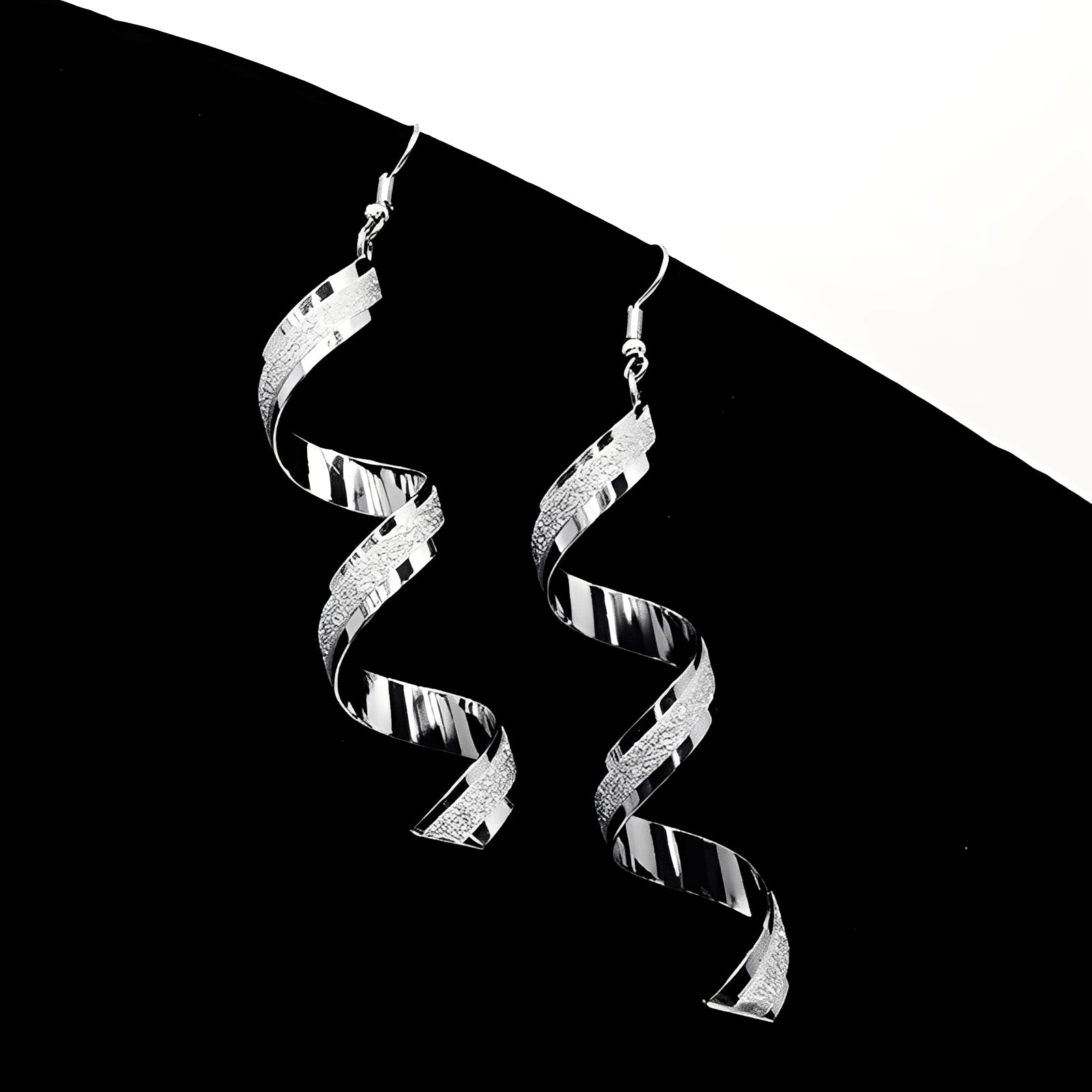 Jia – Pendientes espirales de plata brillantes