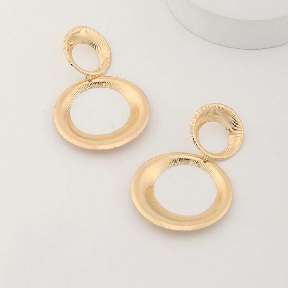Claudia – Pendientes redondos vintage audaces
